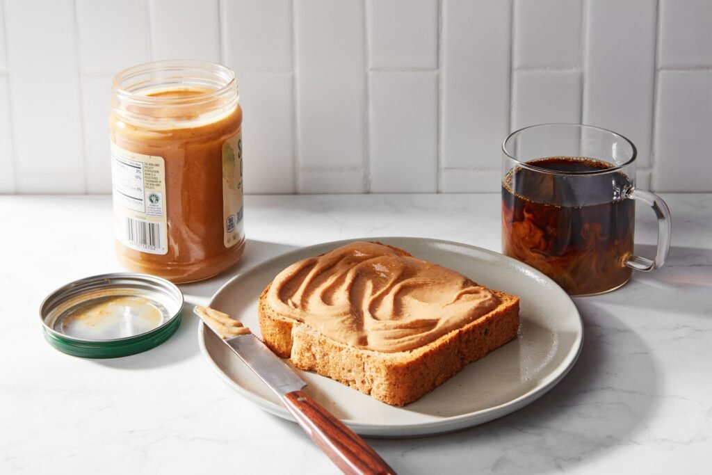 Peanut butter toast breakfast with a cup of coffee